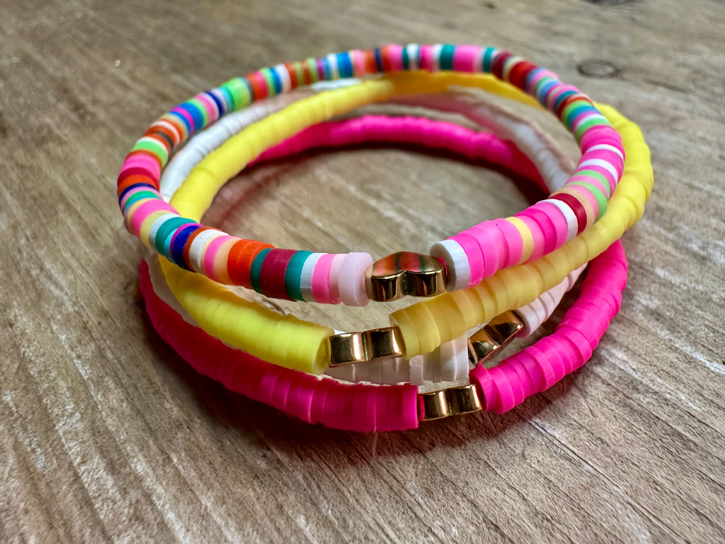 Cute4Girls Colorful Elastic Bracelet featuring a Heart Bead in the center (One Bracelet-multiple colors).